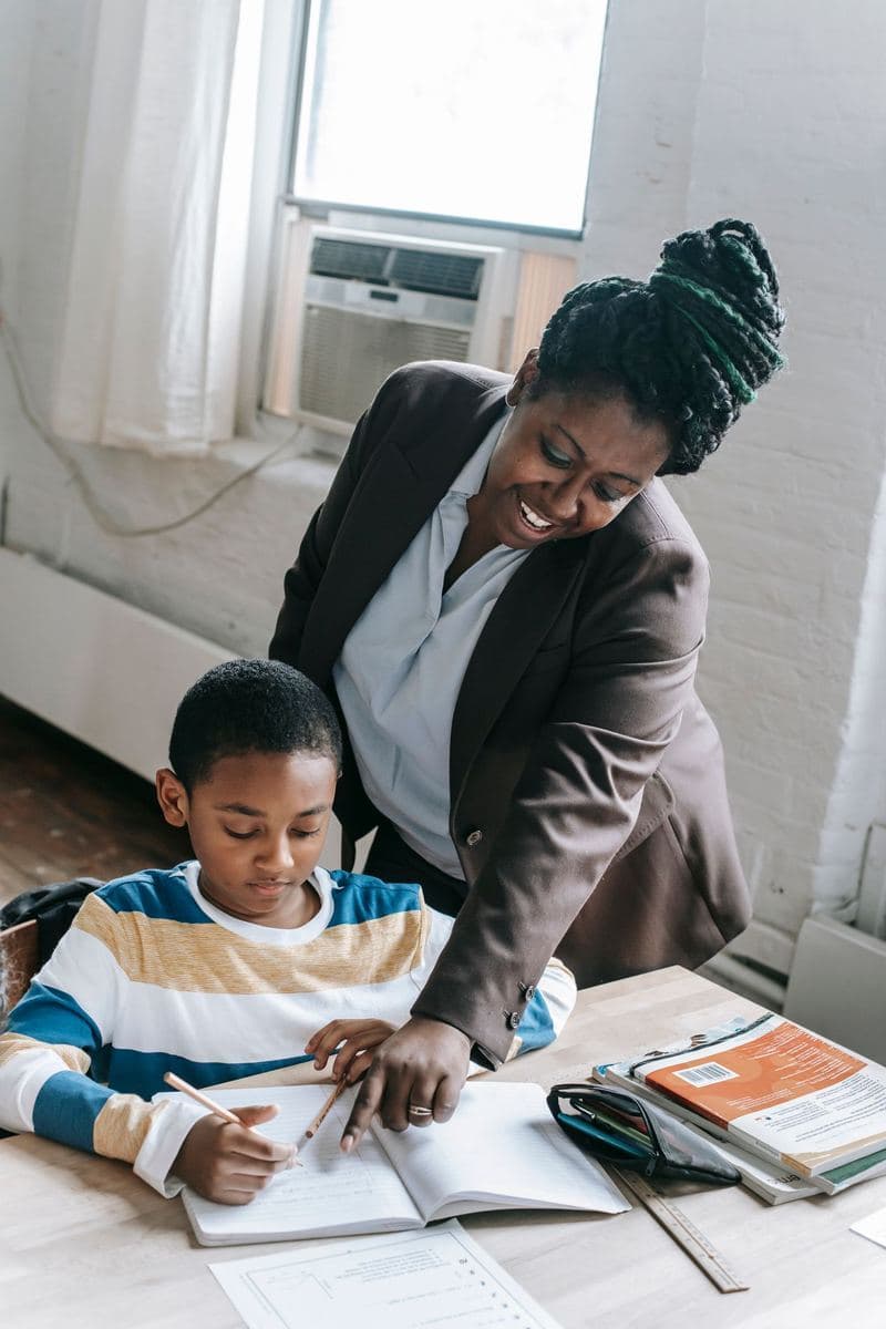 A tutor helping a student with homework
